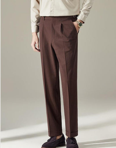 Pointed buttoned pleated pants