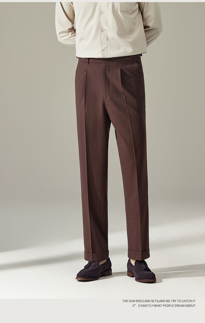 Pointed buttoned pleated pants