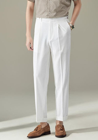 Pointed buttoned pleated pants