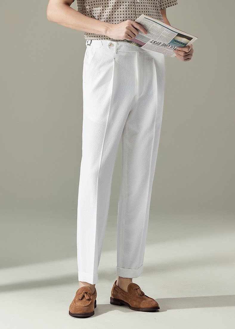 Pointed buttoned pleated pants